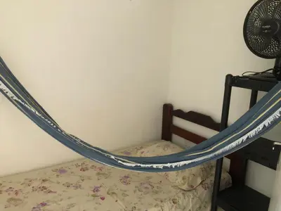 Uma cama ou camas num quarto em Apartamento praia Beira Mar