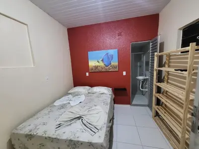Uma cama ou camas num quarto em POUSADA MAR DE IRACEMA