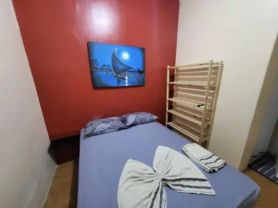 Uma cama ou camas num quarto em POUSADA MAR DE IRACEMA