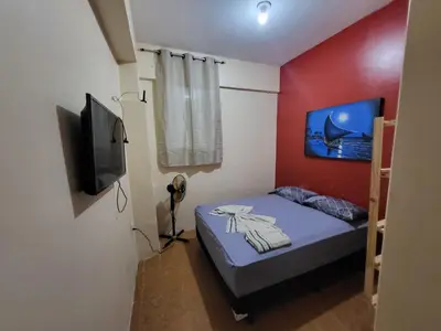 Uma televisão e/ou sistema de entretenimento em POUSADA MAR DE IRACEMA