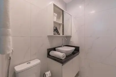 Uma casa de banho em JSmart #304 - Studio em Fortaleza by Carpediem