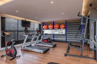 O centro de fitness e/ou as comodidades de fitness de JSmart #304 - Studio em Fortaleza by Carpediem