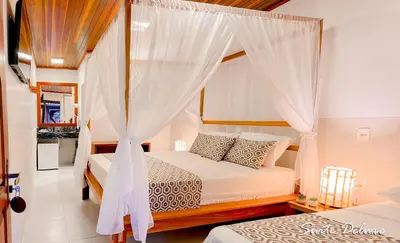 Uma cama ou camas num quarto em Rede Andrade Jeri Hotel