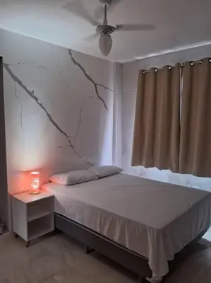 Uma cama ou camas num quarto em Apartamento Praia do Futuro 4 Quartos Morada das Dunas