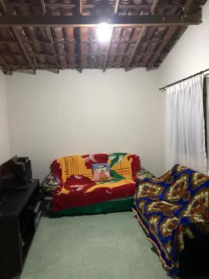 Uma cama ou camas num quarto em Casinha no Sítio