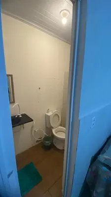 Uma casa de banho em Casinha no Sítio