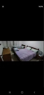Uma cama ou camas num quarto em Triplex Solar Casa Branca 02