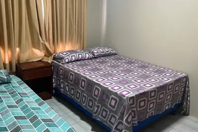Uma cama ou camas num quarto em Aluga-se Apartamento em Fortaleza-CE