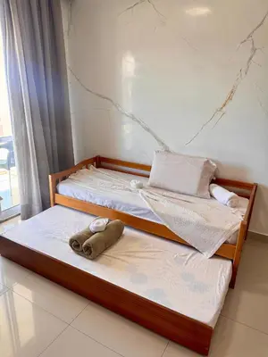 Uma cama ou camas num quarto em VG FUN Praia do Futuro Pé na Areia ap 311 IMOB TEMPORADA