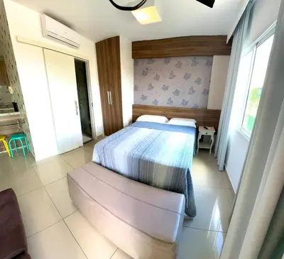 Uma cama ou camas num quarto em VG FUN Praia do Futuro Pé na Areia ap 311 IMOB TEMPORADA