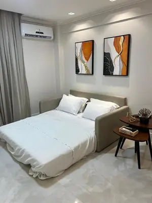 Uma cama ou camas num quarto em Flat Hotel Mercure