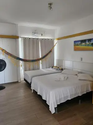 Uma cama ou camas num quarto em Tabajara Flat 205