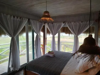 Uma cama ou camas num quarto em Pousada Dunnas Moitas
