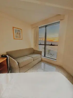 Uma área de estar em Flat Particular em Blue Tree Towers Beira Mar Fortaleza