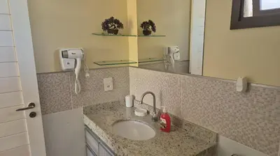 Uma casa de banho em Varandas do Mar pé na areia