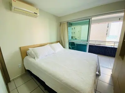 Uma cama ou camas num quarto em Beach Class Fortaleza 402