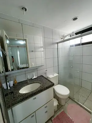 Uma casa de banho em Aquaville Resort - Apartamento Térreo