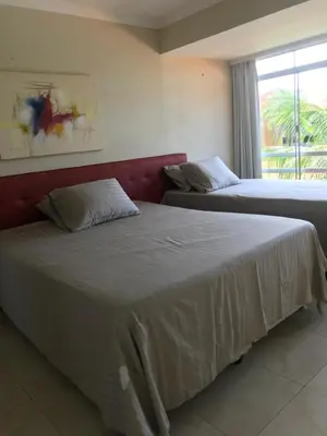 Uma cama ou camas num quarto em Cartier Praia