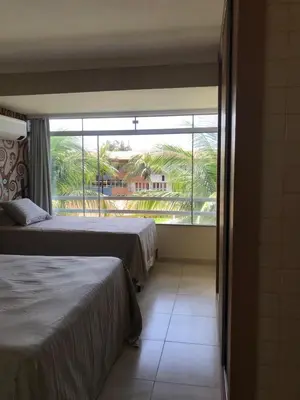 Uma cama ou camas num quarto em Cartier Praia