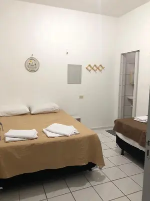 Uma cama ou camas num quarto em Casa Brisa 2