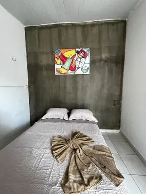 Uma cama ou camas num quarto em Recanto Canoa - Canoa Quebrada