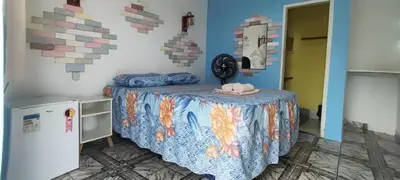 Uma cama ou camas num quarto em Aloha pousada & restaurante