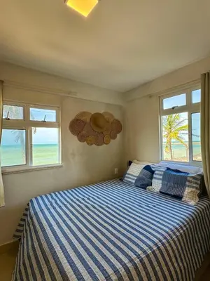 Uma cama ou camas num quarto em Kite house - prox do Cumbuco