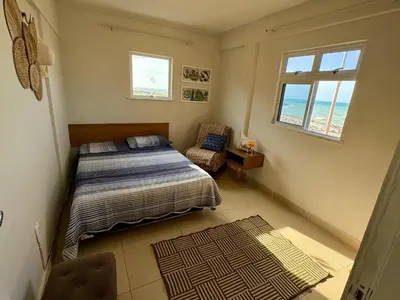 Uma cama ou camas num quarto em Kite house - prox do Cumbuco