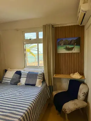 Uma cama ou camas num quarto em Kite house - prox do Cumbuco