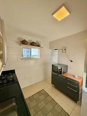 A cozinha ou kitchenette de Kite house - prox do Cumbuco