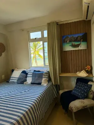 Uma cama ou camas num quarto em Kite house - prox do Cumbuco