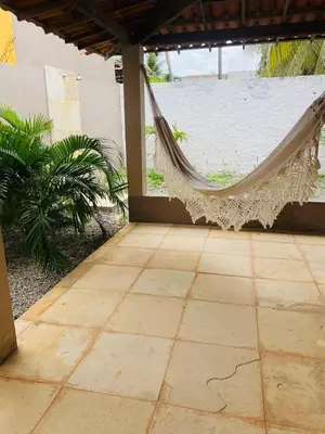 Um jardim no exterior de Casa em Praia de Flecheiras