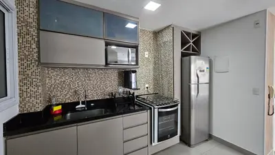 A cozinha ou kitchenette de 64 - Conforto e Vista Mar 2 Quartos no Coração do Meireles