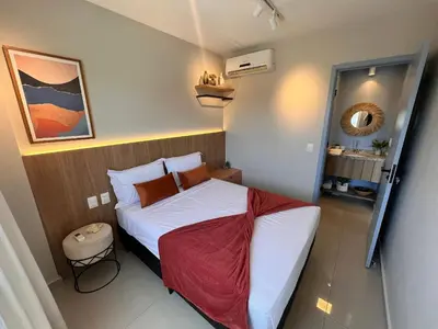 Uma cama ou camas num quarto em Hosts BR - Apartamentos no VG Fun Praia do Futuro Vista Mar