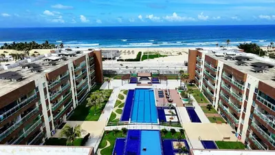 A piscina em ou perto de Hosts BR - Apartamentos no VG Fun Praia do Futuro Vista Mar
