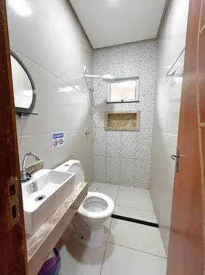 Uma casa de banho em Casa na Praia do Preá, com Piscina