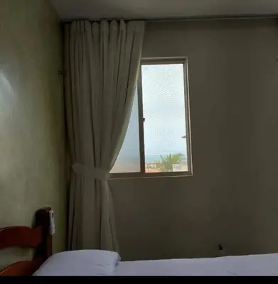 Uma cama ou camas num quarto em Condomínio Sables Blanc