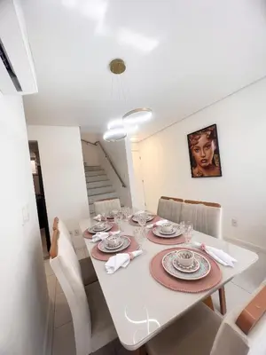 Uma área de estar em Cobertura Palm Beach Porto das Dunas