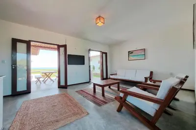 Uma área de estar em Beach Front Villas - Casa ao mar by Carpediem