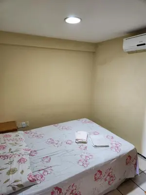 Uma cama ou camas num quarto em Apartamento na Praia de Iracema com vista mar
