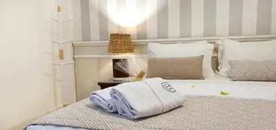 Uma cama ou camas num quarto em Hotel Villa Mayor Charme