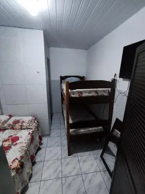Uma cama ou camas num quarto em Pousada Terra do Sol