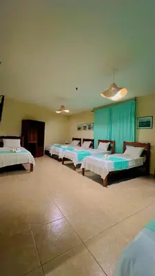 Uma cama ou camas num quarto em Hotel Pousada 360