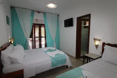 Uma cama ou camas num quarto em Hotel Pousada 360