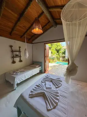 Uma cama ou camas num quarto em Villa Atlântic Icaraizinho 700 m da praia