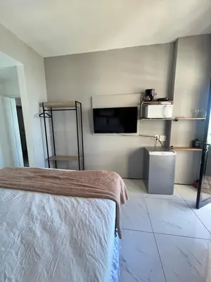 Uma cama ou camas num quarto em 952B Golden Flat Fortaleza