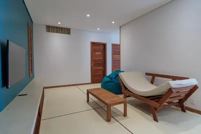 Uma televisão e/ou sistema de entretenimento em Casa KitePirosca, quartos com vista mar em Fortim