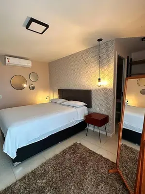 Uma cama ou camas num quarto em Apartamento Paradise Golf Ville