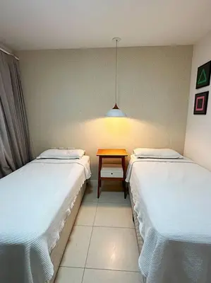 Uma cama ou camas num quarto em Apartamento Paradise Golf Ville