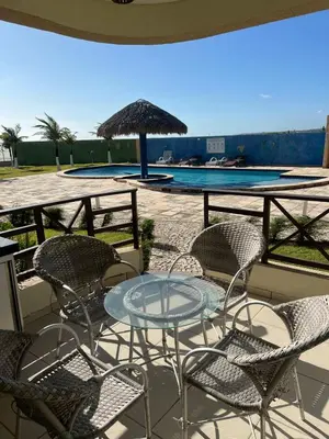 A piscina em ou perto de Apartamento pé na areia na Taiba